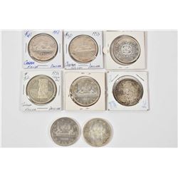 Eight Canadian silver dollar coins including 1951, 1953, two 1958, 196s, 1964 and two 1966