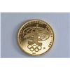 Image 2 : 1980 Russian Olympic 100 ruble gold coin with the Official symbol of the XXII Olympiad against the g