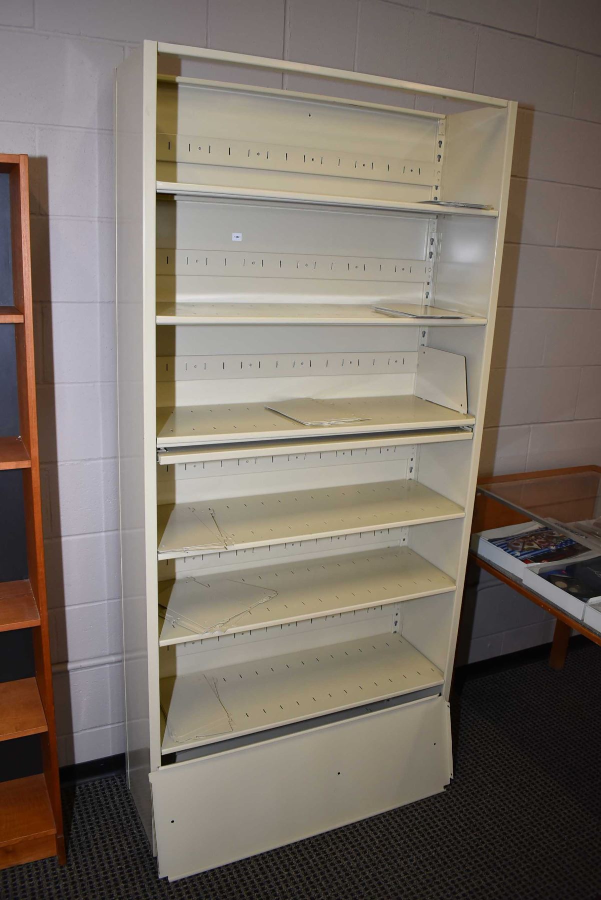 Open filing system with pull out reading ledge