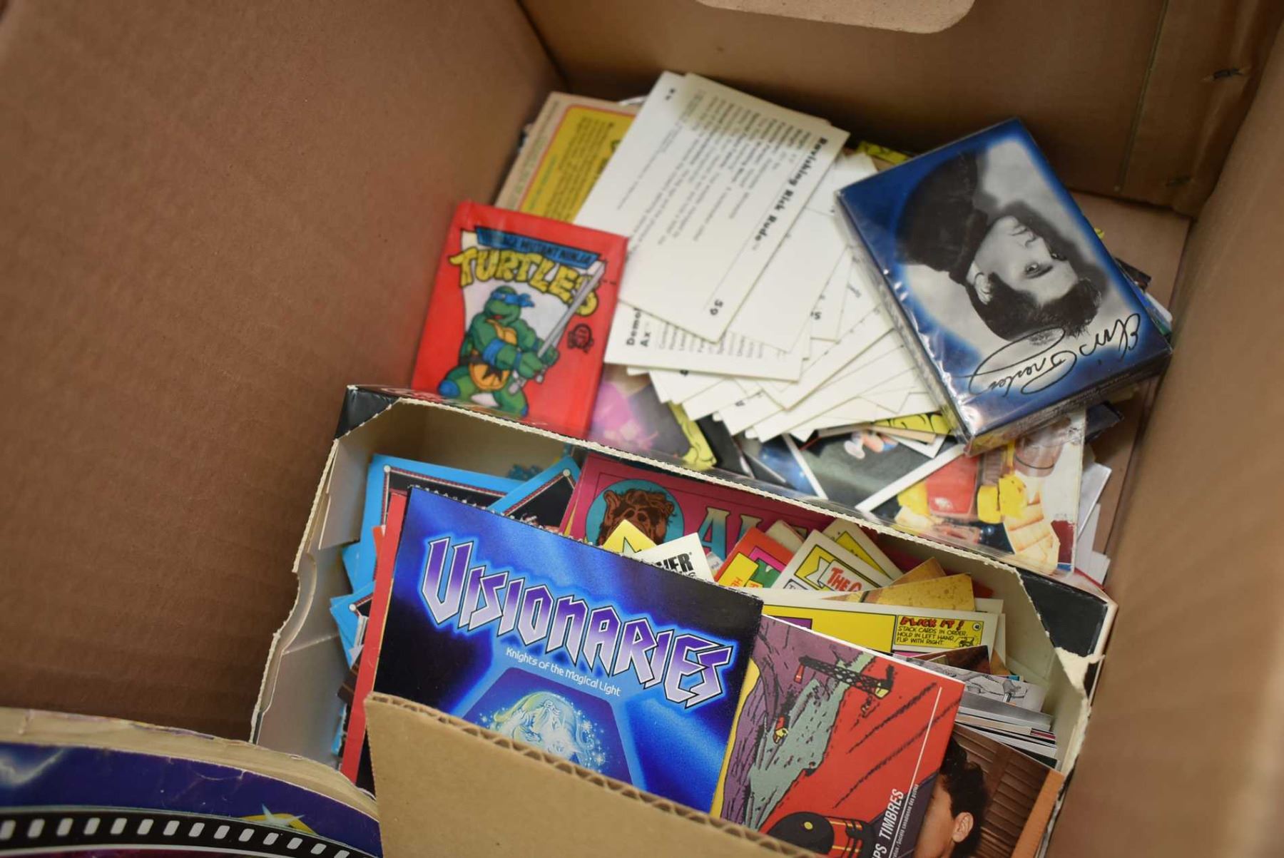 Selection pop culture cards including Batman, Ninja Turtles, W.W.F etc.