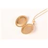 Image 2 : 10kt yellow gold locket on a 10kt yellow gold 16" pendant