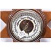 Image 2 : Oak cased mantle clock labelled Foreign and a small wall mount barometer