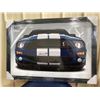 Image 1 : LIMITED EDITION, BEAUTIFULLY FRAMED POSTER OF THE MUSTANG SIGNED BY CARROLL SHELBY. COMES WITH COA. 