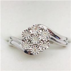 53) STERLING SILVER 7 DIAMOND RING