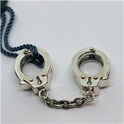 57) STERLING SILVER CHARM