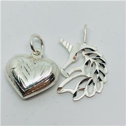 58) LOT OF 2 SILVER PENDANTS