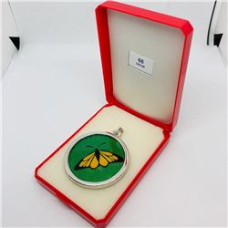 66) STERLING SILVER PENDANT