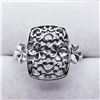 Image 1 : 122) STERLING SILVER FLOWER PATTERN RING