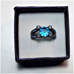 15)  BLACK GOLD FILLED RING WITH AQUA CZ
