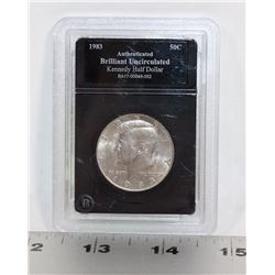 1983 AUTHENTICATED BU KENNEDY HALF DOLLAR COIN.