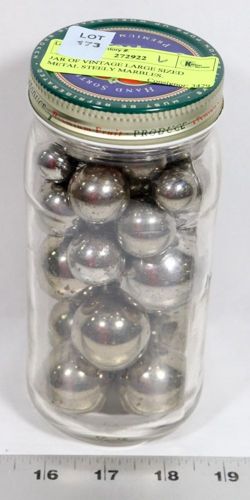JAR OF VINTAGE LARGE SIZED METAL STEELY MARBLES.
