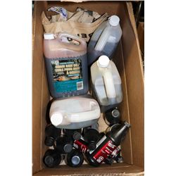 BOX WITH CHAIN SAW OIL AND ASSORTED BRAKE FLUID