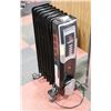 Image 1 : OIL FILLED HOUSE HEATER.