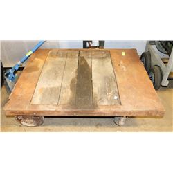 ANTIQUE SOLID IRON WHEELED CART -