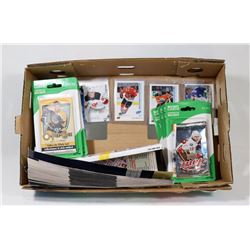 BOX OF HOCKEY PACKS AND UPPER DECK ROOKIES