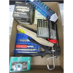flat full of Assorted items / wire brush , calking gun , precision screwdrivers