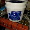 Image 2 : TUB OF PINK SOLUTION CLEANER AND STAINLESS STEEL HOSES
