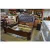 Image 1 : ASHLEY FLOOR MODEL KINGSIZE DARK CARVED SLEIGH BEDFRAME WITH BROWN LEATHER TUFTED INSERT, RETAIL $28