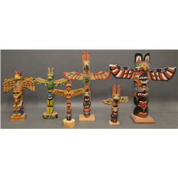 COLLECTION OF NORTHWEST COAST TOTEM POLES