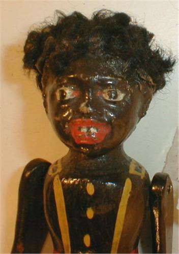 black wooden dolls