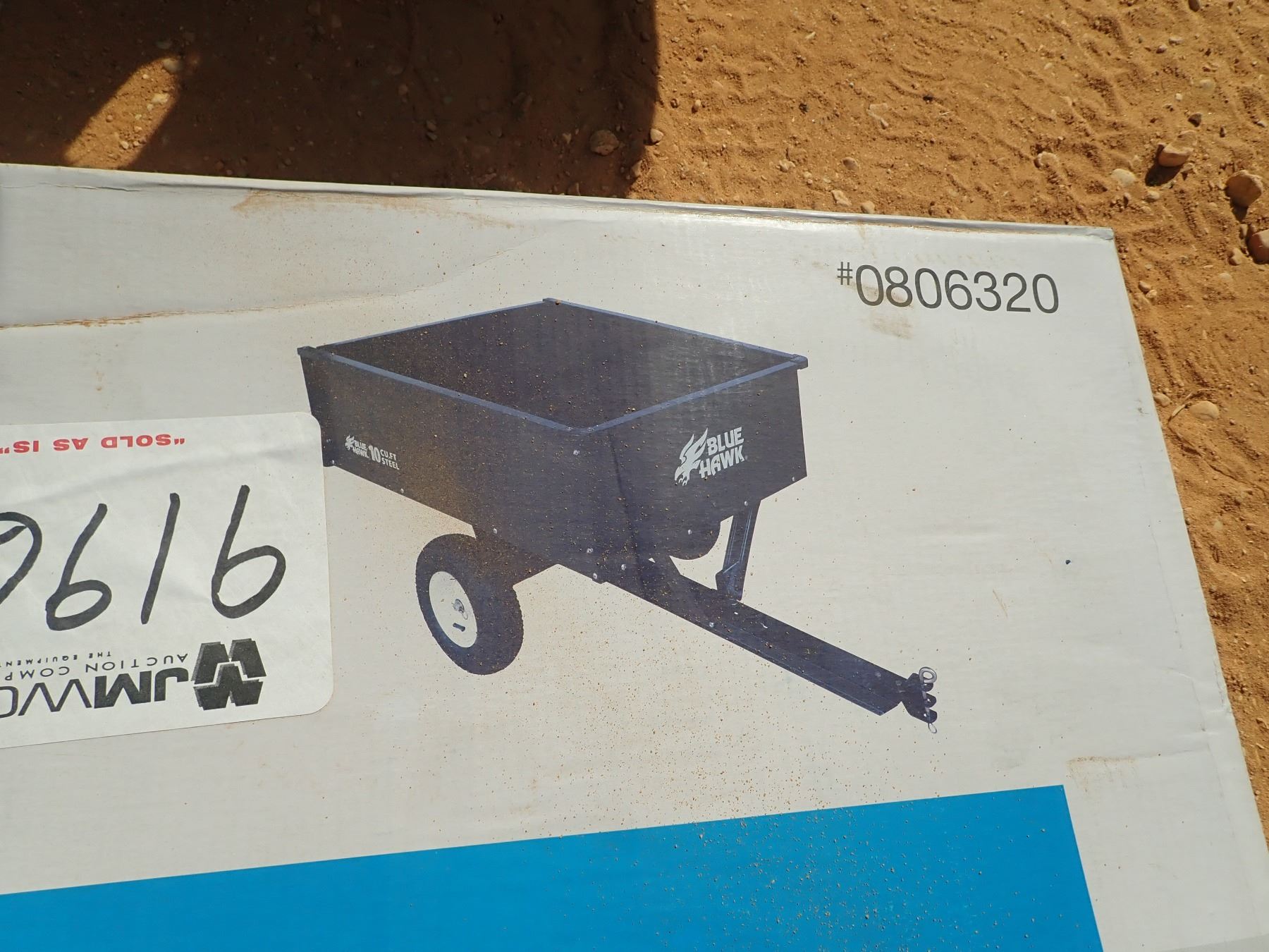 UNUSED BLUE HAWK 10 CU FT S/A DUMP CART - J.M. Wood Auction Company, Inc.