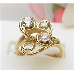 Ladys diamond ring with three diamonds approx .55