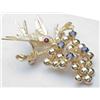 Image 1 : 14kt yellow gold pin bird on branch with sapphire