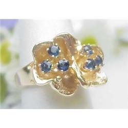 Ladys 14kt yellow gold floral design ring with sa