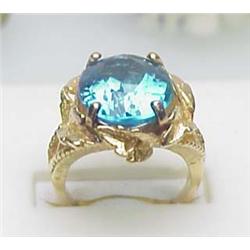 Ladys blue topaz ring 14kt yellow gold 8.9gr size