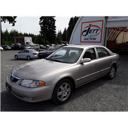 E5 --  2002 MAZDA 626 , Brown , 97763  KM's