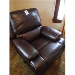 NEW LEATHER RECLINER IN A DARK BROWN