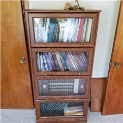 4 DOOR GLASS AND WOOD BOOK CASE/CABELLA AND HUNTING BOOKS NOT INCLUDED