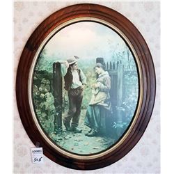 OVAL FRAMED PRINT DEPICTING BOY AND GIRL AT GATE