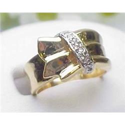 Lady's 14kt yellow gold buckle style ring with sm