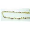 Image 1 : Lady's ruby and diamond bracelet .12ctw 14kt yell