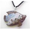 Image 1 : Carved opal fish with natural matrix 55x35mm on c