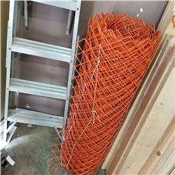 ROLL OF ORANGE MESH FENCING