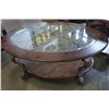 Image 2 : ASHLEY FLOOR MODELL OVAL GLASS TOP COFFEE TABLE AND ROUND ENDTABLE, RETAIL $799