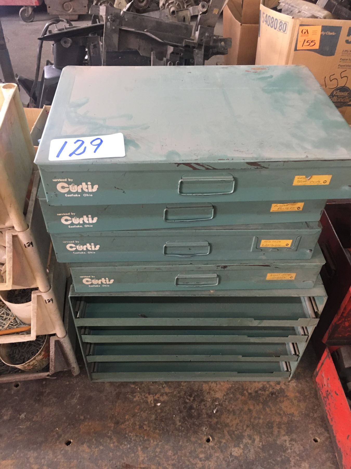 4 Curtis metal cases w/bumper bolts, lug nuts, clips, etc. plus 4