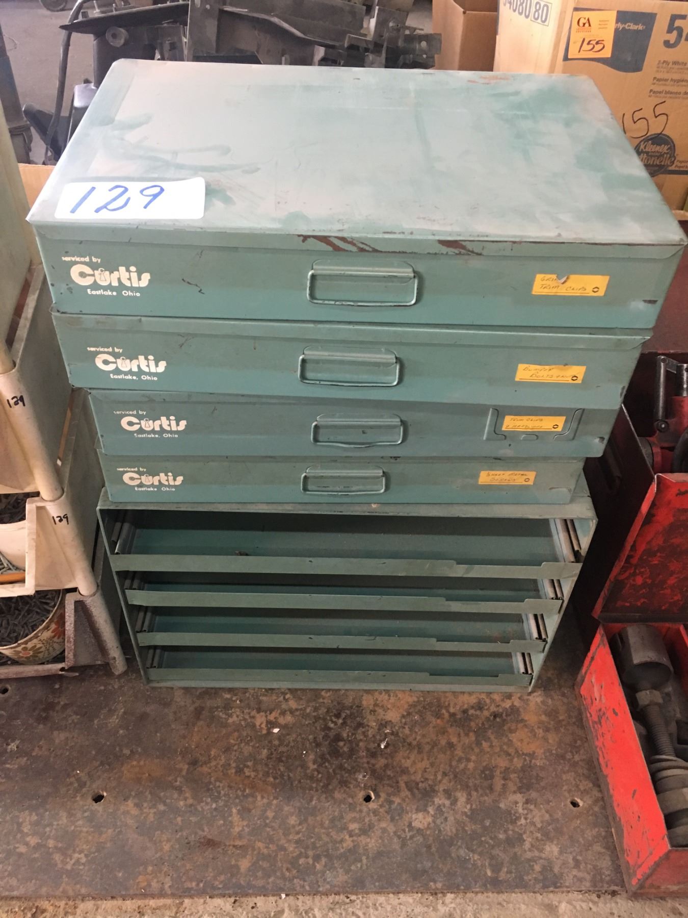 4 Curtis metal cases w/bumper bolts, lug nuts, clips, etc. plus 4