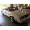 Image 2 : 1982 Chrysler Lebaron 2 dr convertible, white, 4 cyl. auto. appro. 85,000 klms, runs and drives well