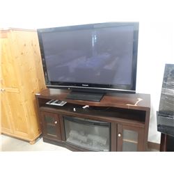 PANASONIC FLAT SCREEN TV WITH WOOD ENTERTAINMENT STAND AND BUILT-IN FIREPLA
