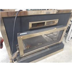 BRASS FRONT IN SET FIREPLACE