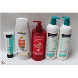 BAG OF ASSORTED SHAMPOOS AND CONDITIONERS