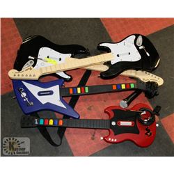 LOT OF 4 GUITAR HERO GUITARS WITH MICROPHONE