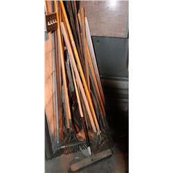 LARGE LOT OF ASSORTED SHOVELS, RAKES, BROOMS AND