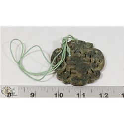 HALLOWED CARVED JADE PENDANT.