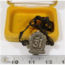 TIBETAN STASH BOX PENDANT WITH LEATHER CORD.