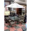 Image 1 : METAL AND GLASS PATIO TABLE WITH 4 CHAIRS AND