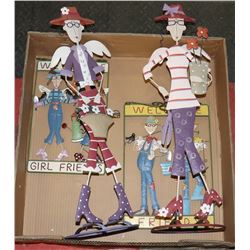 4 METAL DECORATIVE FIGURES.